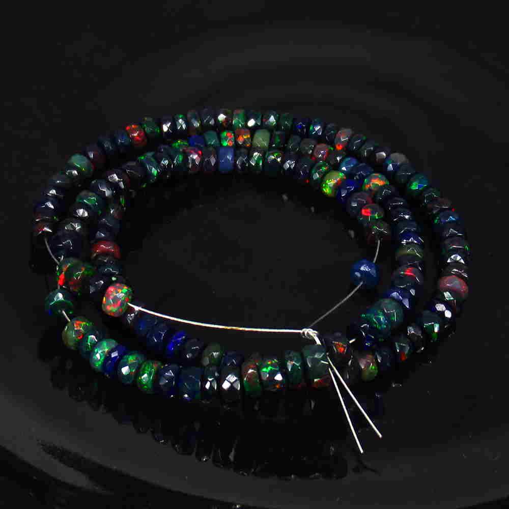 71.57 Ctw Natural 143 Faceted Black Opal Beads Necklace: Title: 71.57 Ctw Natural 143 Faceted Black Opal Beads Necklace Stone Clarity: Translucent Gemstones: Faceted Black Opal Beads Carat Weights: 71.57 Size/Dimensions: 4.70 to 5.00 mm / 143 PC's / 16.3" I
