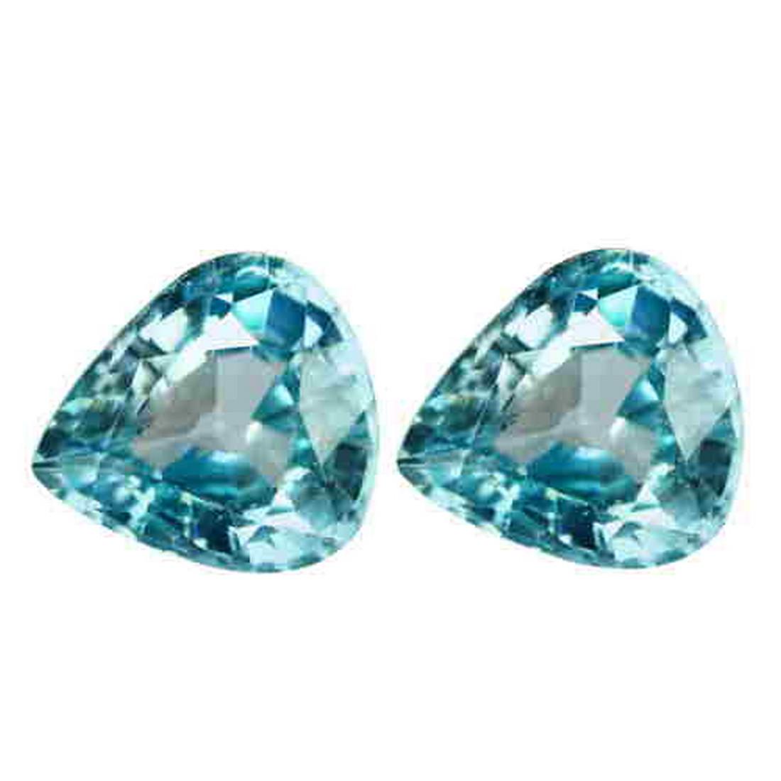 Pear cut AAA blue zircon pair: Title: Pear cut AAA blue zircon pair Color/Clarity: Blue/IF Gemstone Type: natural/untreated Carat Weights: 3.71 Size/Dimensions: 7.56 x 6.77 x 4.24 MM Additional Information: Please ,note that the it