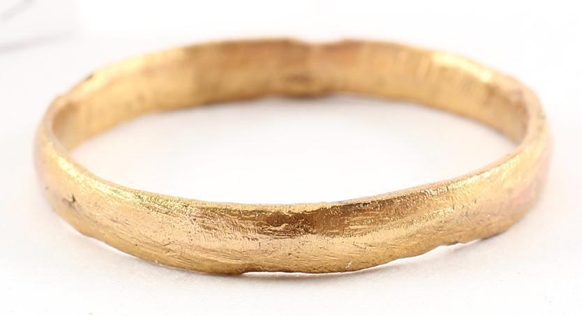 VIKING WOMAN’S WEDDING RING SIZE 8 ½.: 9th- 11th century. Gilt bronze, size 8 1/2. Rounded face band 2.9mm width band. Surface slightly textured overall from burial. Vikings exchanged rings on the pommel of the groom’s sword. Professiona