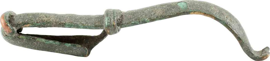 GREEK BROOCH (GARMENT PIN) FIBULA 3RD-1ST CENTURY BC: No Reserve! The original garment pin patented two millennia later as the “safety pin”. Arch form with a medieval ring. The pin seat intact. These served as a fashion accessory as well as a garment