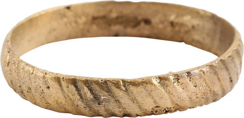 RARE VIKING RIBBED WEDDING RING 10th CENTURY SIZE 10: Gilt bronze, size 10. Broadband, 3.8mm, of low rounded section. Probably cast with a core as the inside shows distinct tool finishing. The face hand-cut overall in angled hatch marks. The spacing and