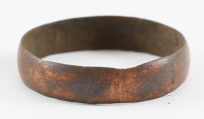 RARE COPPER VIKING RING, 900-1050 AD JEWELRY SIZE 9 ½: Size 9 1/2. 4.8mm width with a rounded face. As found with red copper patina and slight encrustation from burial. Vikings were expert metallurgists. The use of pure copper is rare and suggests a super