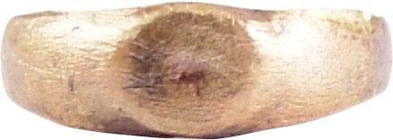 MEDIEVAL WOMAN’S RING C.1200-1400 AD SIZE 4 ½: Size 4 ½ for the small finger as was the custom. 2.9mmband flaring to the shoulders, with rounded face. Low raised oval bezel with star-like central figure (worn from use). The 24karat gold surface r