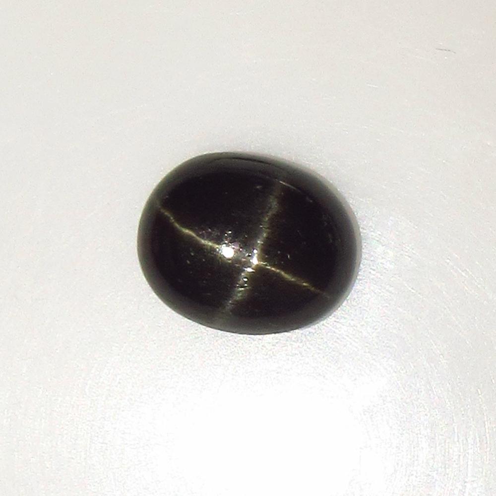 5.60 Ct Natural Sharp Line Black Diopside Oval Cab (1 of 2)