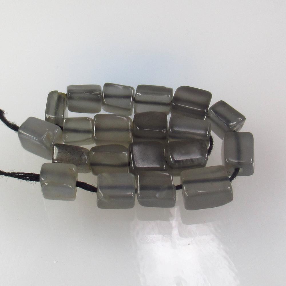 14.23 Ctw Natural 20 Drilled Moonstone Square Beads: No Reserve! Title: 14.23 Ctw Natural 20 Drilled Moonstone Square Beads Stone Clarity: Semi-Transparent Gemstones: Blue Moonstone Beads Carat Weights: 14.23 Size/Dimensions: 4.1x3.5 to 6.3x4.3 mm / 20