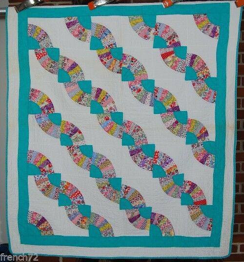 30's Snail Trails Crib Quilt: This cotton 20's/30's fans/snail trails crib quilt is hand pieced and hand quilted, with cheery solid green accents (not as blue as it may appear in the photos). It measures 46" X 52" and is in very g