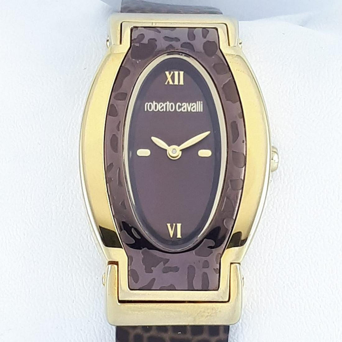 Roberto Cavalli - Ref:25100 - Women - 2011-present: Brand : Roberto Cavalli Ref : 25100 Gender : Women Movement : Quartz Type : Analogue wristwatch Total Lenght : 20 cm / 7,87 inch (Including Watch Case) Case Size : 43 x 28 mm / 1,69 x 1,1 Inch