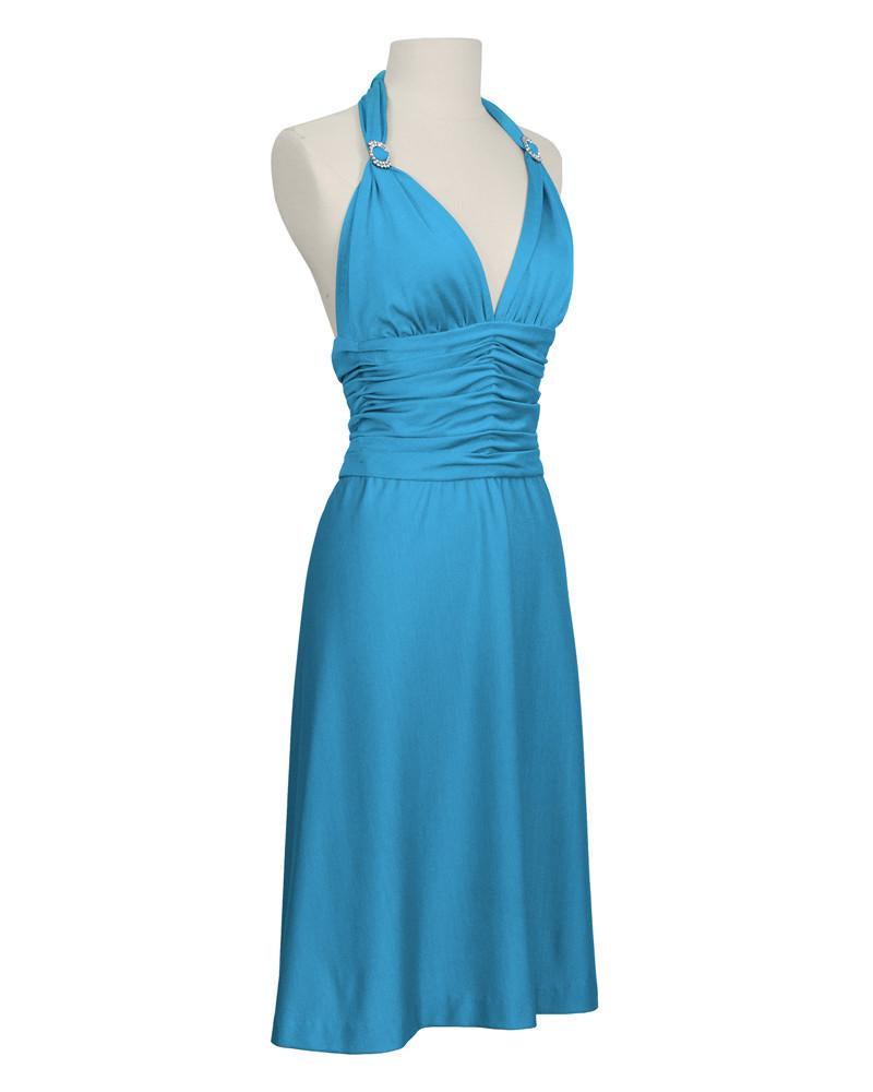 Loris Azzaro Blue Halter Dress: Early 1980's Azzaro turquoise halter dress. Stretchy lycra material gives off a sheen thatÂ’s complimented by the rhinestone buckles (replaced) on the shoulders. Ruching at waist, zipper up the bac