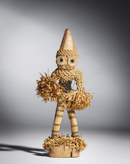 Pende Minganji Masquerader Dancer Figure, RDC: Title: Pende Minganji Masquerader Dancer Figure, RDC Date/Period: middle 20th C Materials:Rafia, wood, pigments, fiber Dimension:23 (H) cm. Description:"Although the Minganji face masks make an appear