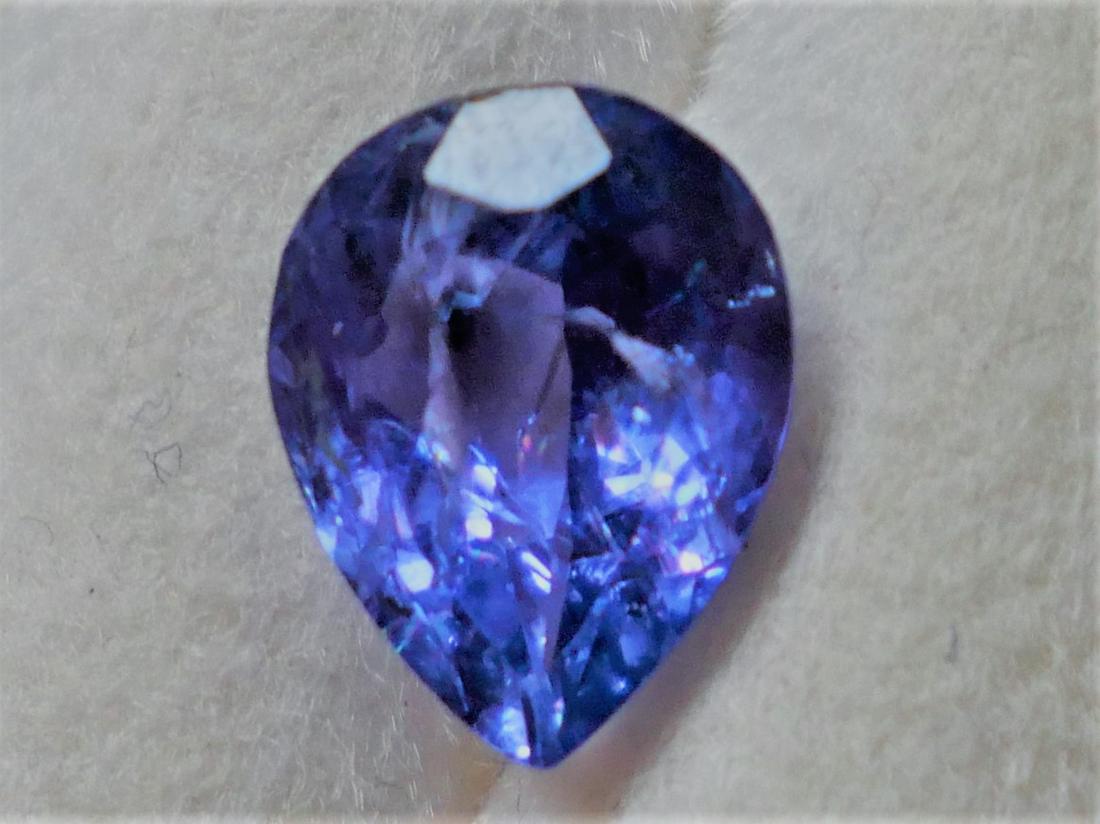 TANZANITE 1.69 ct **VERY RARE**: Title: TANZANITE 1.69 ct **VERY RARE** Gemstones: Tanzanite Carat Weights: 1.69 ct Size/Dimensions: 9.00 x 6.90 x 4.50 mm Reserve: $120.00 Shipping: Domestic: Flat-rate of $18.00 to anywhere within th