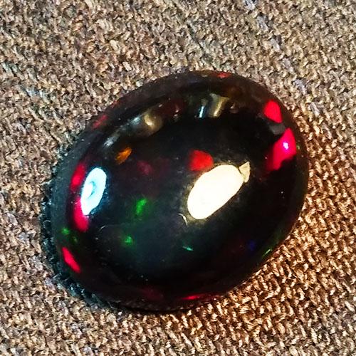 1.30 CTS NATURAL ETHIOPIAN BLACK OPAL OVAL SHAPE GOOD: Title: 1.30 CTS NATURAL ETHIOPIAN BLACK OPAL OVAL SHAPE GOOD LUSTER LOOSE GEMSTONES Brand: MRS GEMS Carat Weights: 1.3 Size/Dimensions: 9.7 x 7.7 x 3 MM Additional Information: HEATED WITH PLAY OF COL