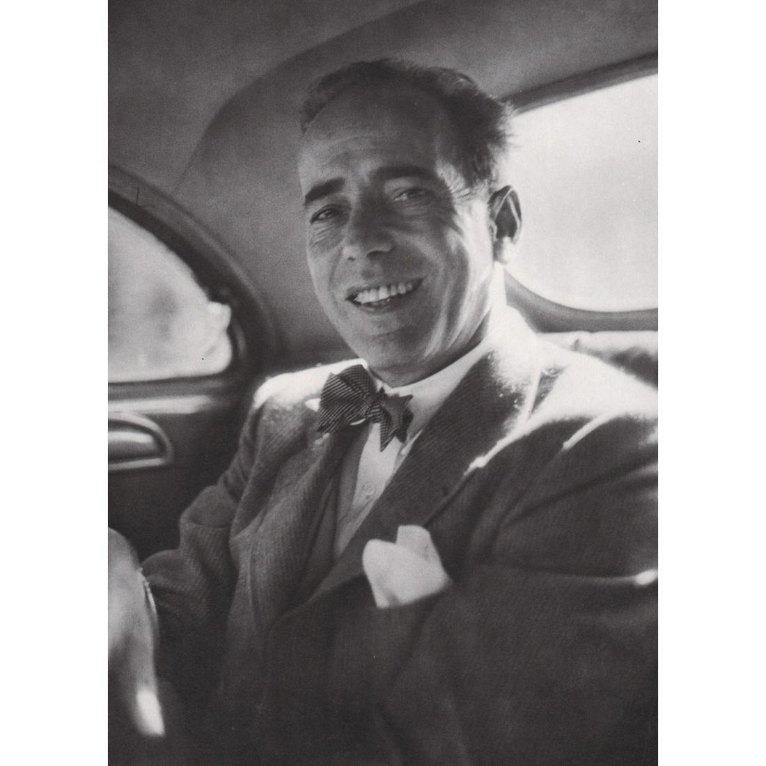 RUTH ORKIN - Humphrey Bogart: Artist: RUTH ORKIN Print Title: Humphrey Bogart in a cab, NYC Medium: Sheet-fed Gravure Printing Date: 1980's Printed in the USA Image Size approx: 8.5 X 6 inches Ruth Orkin (1921-1985) was an America