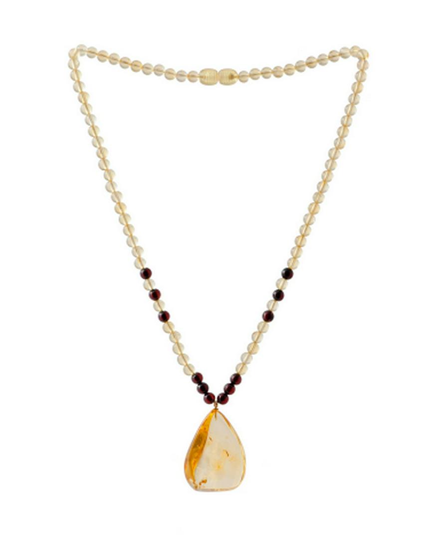 Natural Baltic Amber Necklace: Title: Natural Baltic Amber Necklace Materials: Natural Baltic Amber Weight in grams: 11.022 Additional Information: Natural Baltic Amber Necklace. Ball shaped. Lemon and cherry colors. Composition Re