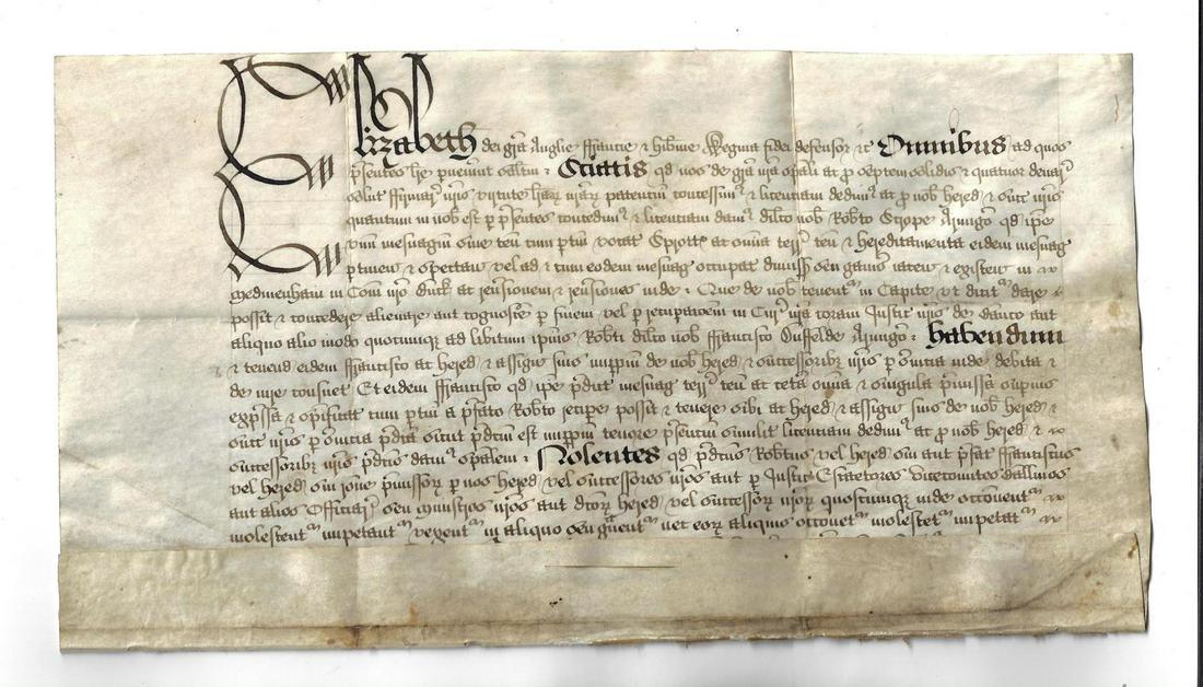 1592 Vellum Elizabethan License of Alienation: Beautifully penned Elizabethan manuscript on vellum being a License of Alienation from a Robert Swope to Francis Duffield, signed at the bottom "Bacon".Calligraphic script in Latin with large initial 