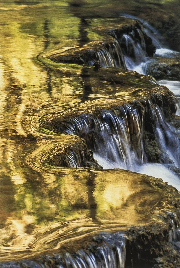 DUGLAD BREMNER - Travertine Terraces, Havasu Creek: Title: DUGLAD BREMNER - Travertine Terraces, Havasu Creek Medium: Photo Litho, 2006, China Dimensions: 4.8x7.2" Description: Heat Wax Mounted on 8.5x11" Conservation Board Artist Bio: Reserve: $45.00