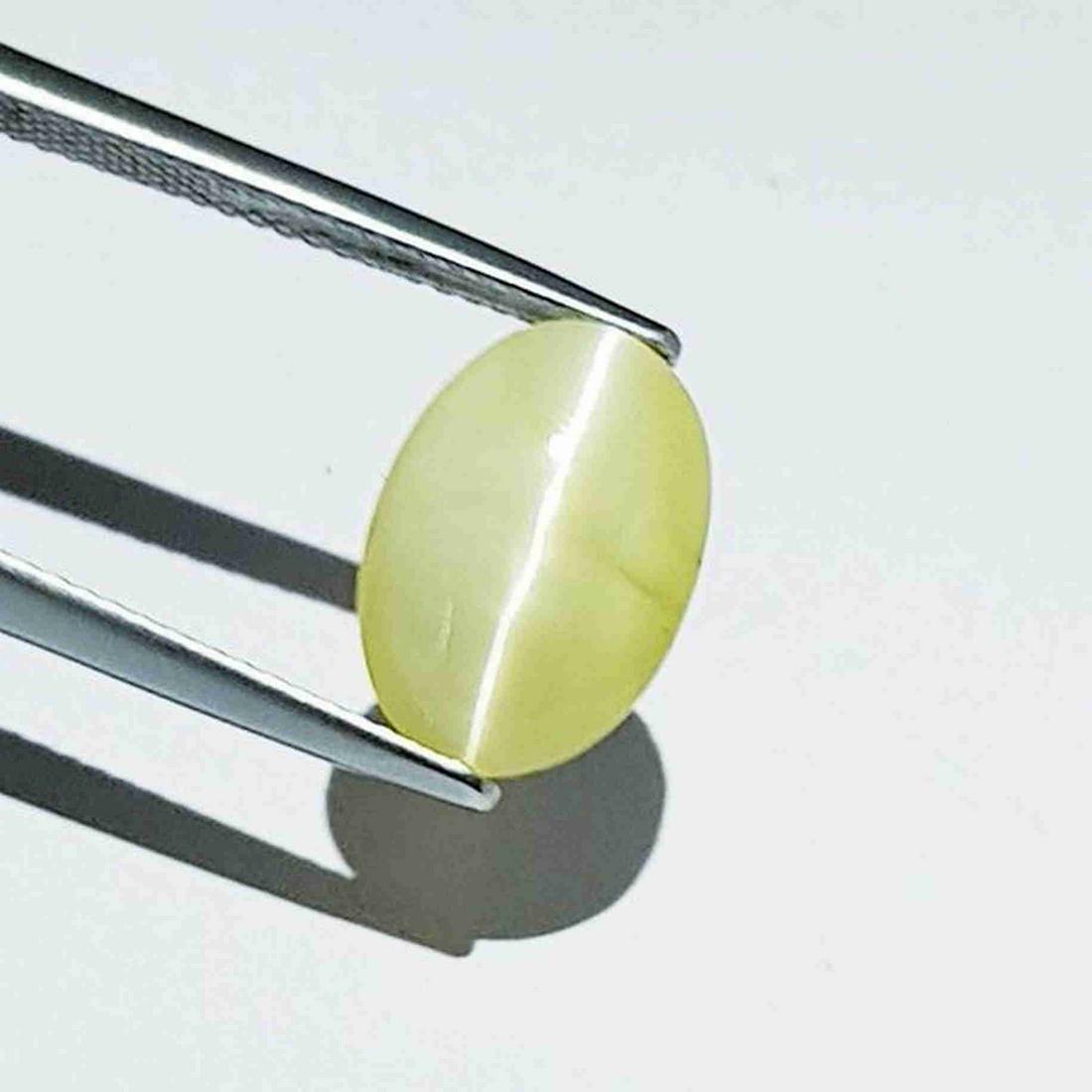 4.74 ct Natural Opal Cat's Eye: No Reserve! Title: 4.74 ct Natural Opal Cat's Eye Color/Clarity: Semi Transparent Carat Weight: 4.74 Dimensions: 13.00 x 9.10 x 7.30 Additional Information: Oval - Africa Shipping: Domestic: Flat-rat