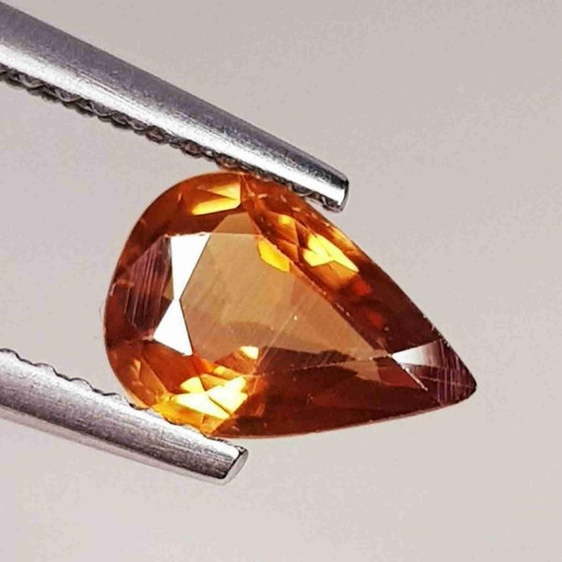 1.06 ct Natural Zircon Pear Cut: No Reserve! Title: 1.06 ct Natural Zircon Pear Cut Color/Clarity: VVS Carat Weight: 1.06 Dimensions: 8.50 x 5.90 x 2.90 Additional Information: Pear - Cambodia Shipping: Domestic: Flat-rate of $10.00