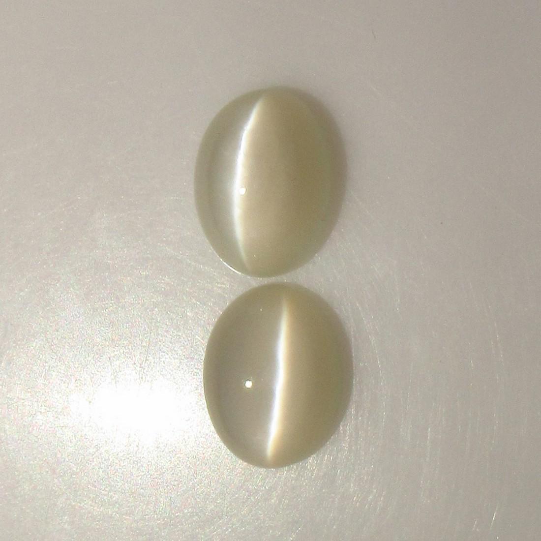 7.00 Ctw Natural Moonstone Oval Pair: No Reserve! Title: 7.00 Ctw Natural Moonstone Oval Pair Stone Clarity: Semi-Transparent Gemstone: Moonstone Carat Weight: 7.00 Dimensions: 10.80 x 8.20 x 5.10 mm / 2 PC's Additional Information: Nice 