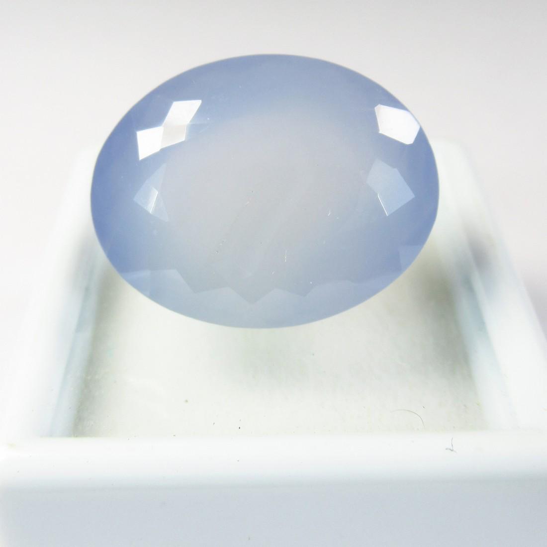 20.70 Ctw Natural Chalcedony Oval Cut: No Reserve! Title: 20.70 Ctw Natural Chalcedony Oval Cut Stone Clarity: Semi-Transparent Gemstone: Chalcedony Carat Weight: 20.70 Dimensions: 19.50 x 15.50 x 12.00 mm Additional Information: Excellent