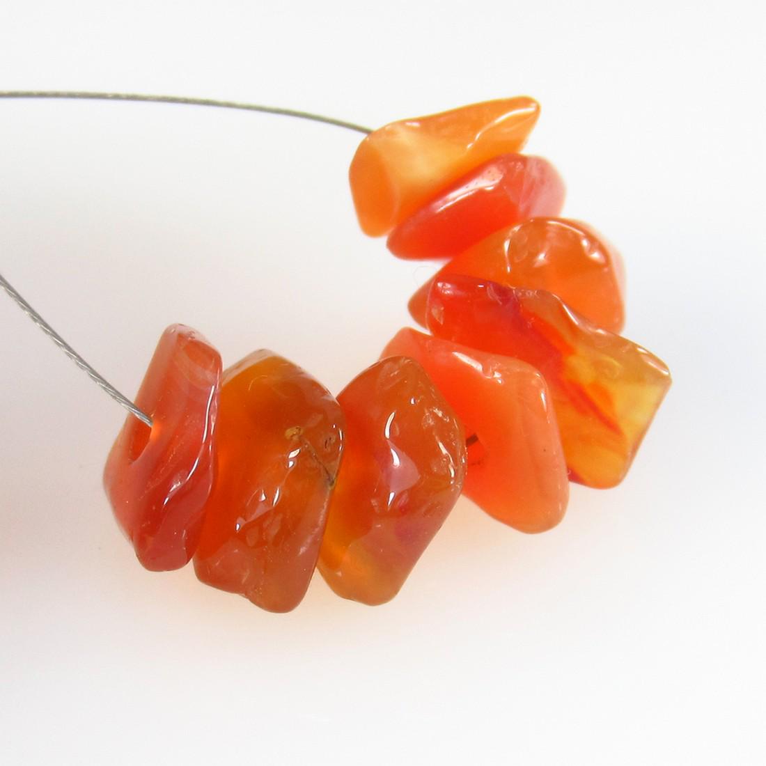 15.48 Ctw Natural 8 Carnelian Drilled Unshaped Beads: No Reserve! Title: 15.48 Ctw Natural 8 Carnelian Drilled Unshaped Beads Stone Clarity: Semi-Transparent Gemstone: Carnelian Beads Carat Weight: 15.48 Dimensions: 7.1x2.8 - 10.2x3.6 mm / 8 Pc's Additio