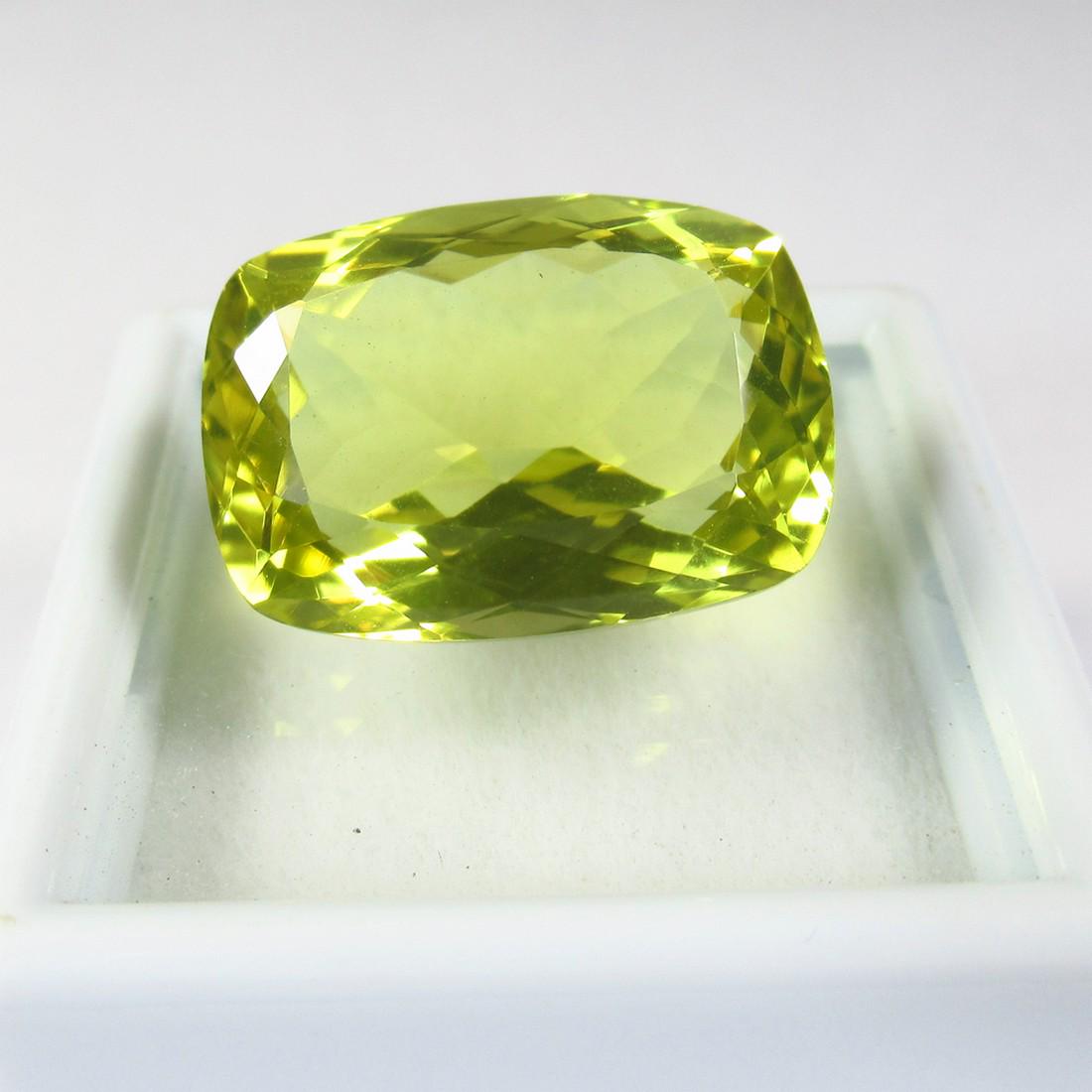 14.21 Ctw Natural Lemon Quartz Cushion Cut: No Reserve! Title: 14.21 Ctw Natural Lemon Quartz Cushion Cut Stone Clarity: VVS Gemstone: Lemon Quartz Carat Weight: 14.21 Dimensions: 18.00 x 13.00 x 8.90 mm Additional Information: Good Luster / To