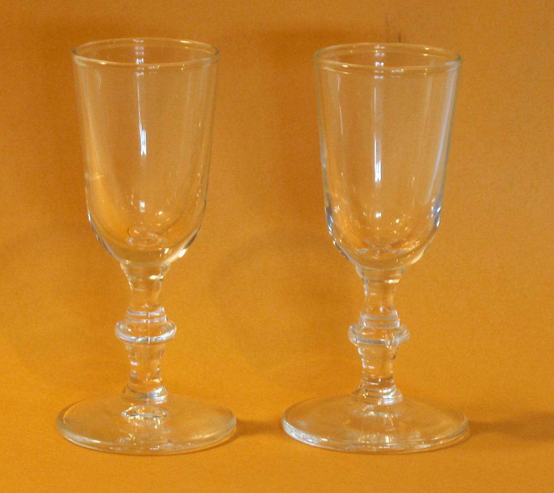 Early wine glasses.: Title: Early wine glasses. Description: 2 vintage wine glasses. Dimension: 3 1/2” high Circa: 1900's Shipping: Domestic: Flat-rate of $15.00 to anywhere within the contiguous U.S. International: For