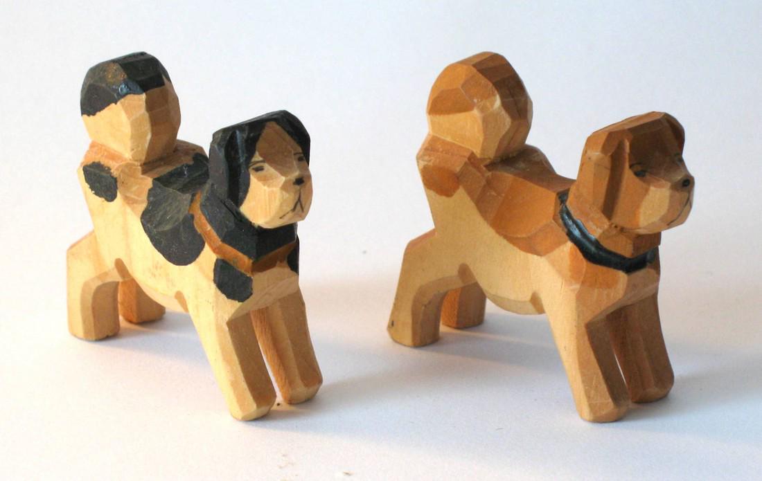 Two miniature wood carved dogs. (1 of 1)