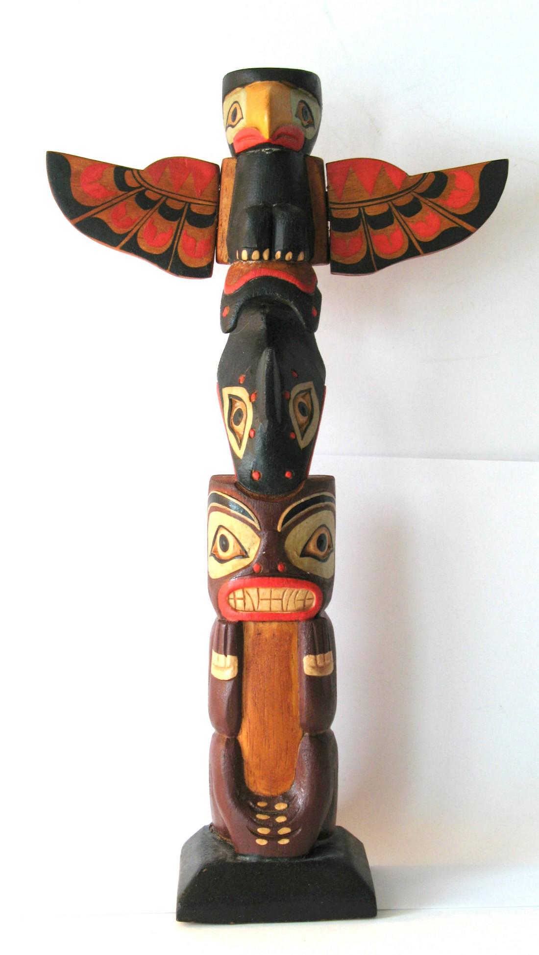 Nice tourist trade totem pole.: Title: Nice tourist trade totem pole. Description: Nice vintage tourist trade totem pole with interesting figures and original paint & patina. Marked on the back Eagle, Whale & Bear. Dimension: 12” 