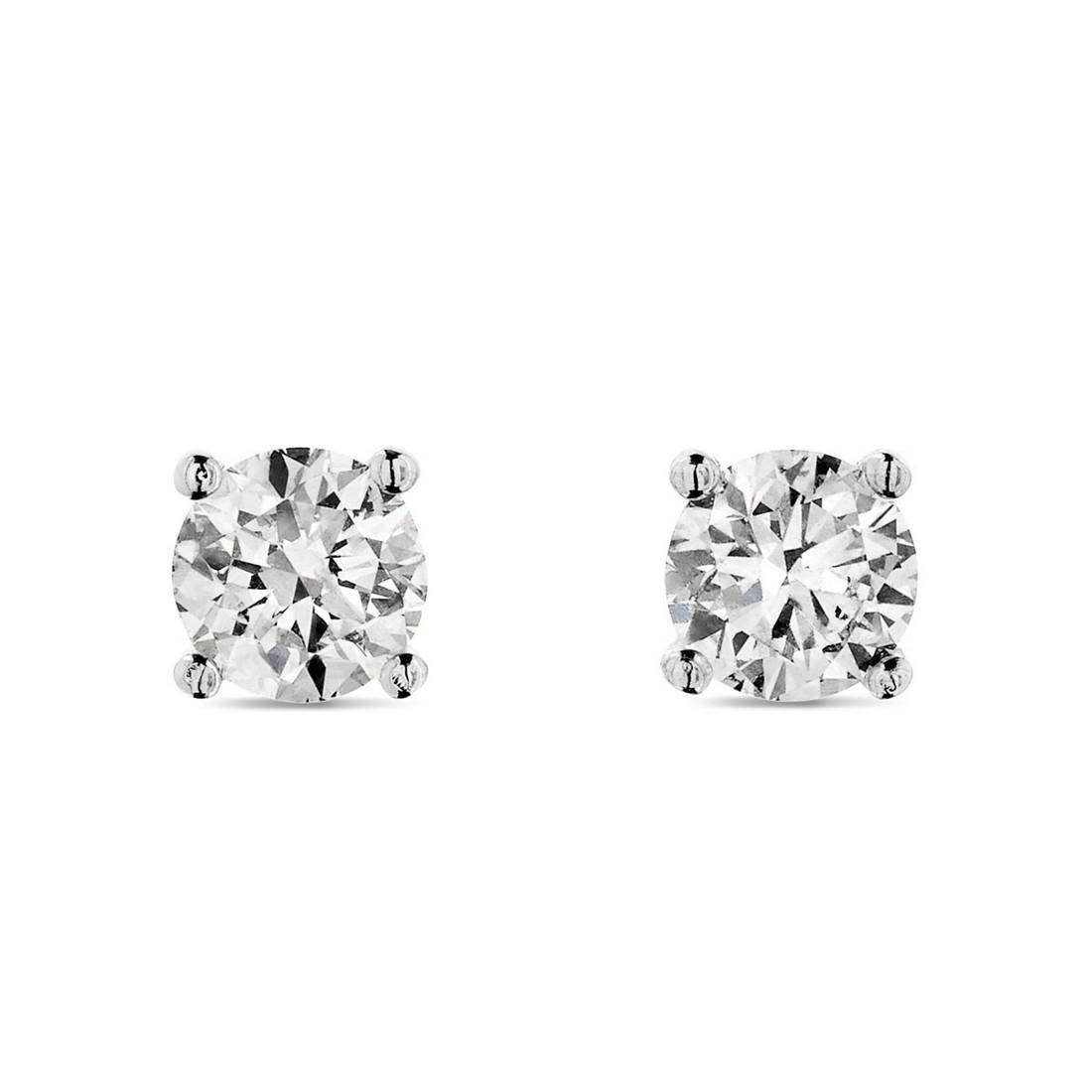 A Pair Of Diamond Stud Earrings (1 of 2)