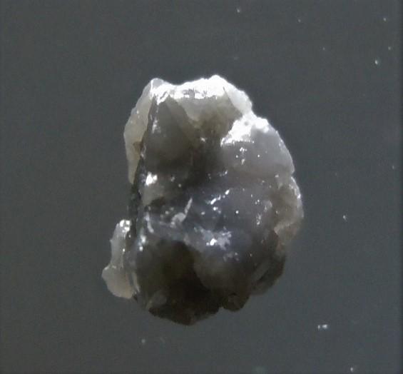 0.2 CT ROUGH DIAMOND - UNTREATED GEMSTONE: Title: 0.2 CT ROUGH DIAMOND - UNTREATED GEMSTONE Origin: Elandskloof, Mpumalanga, South Africa Size: 0.33x02x0.2 cm / 0.04 gram complex, irregular shaped, silvery rough diamond Reserve: $4.00 Shipping