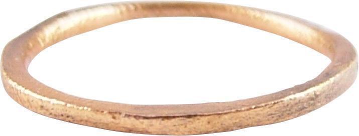 ANCIENT VIKING WEDDING RING SZ 4¾ JEWELRY: Late 9th-11th century AD. Gilt bronze, size 4 ¾ for the small finger as was the custom. 1.4mm width band with a low-rounded face and flat sides. Vikings exchanged rings on the pommel of the groom’s