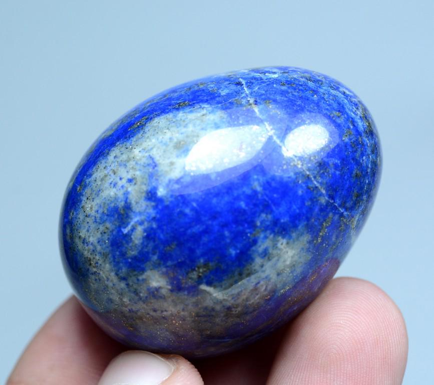 96 Gram Amazing Quality Lapis Lazuli Egg: Title: 96 Gram Amazing Quality Lapis Lazuli Egg Weight: 96 Gram Size/Dimensions: 47x35x35 mm Origin: Afghnistan Reserve: $20.00 Shipping: Domestic: Flat-rate of $15.00 to anywhere within the contiguou