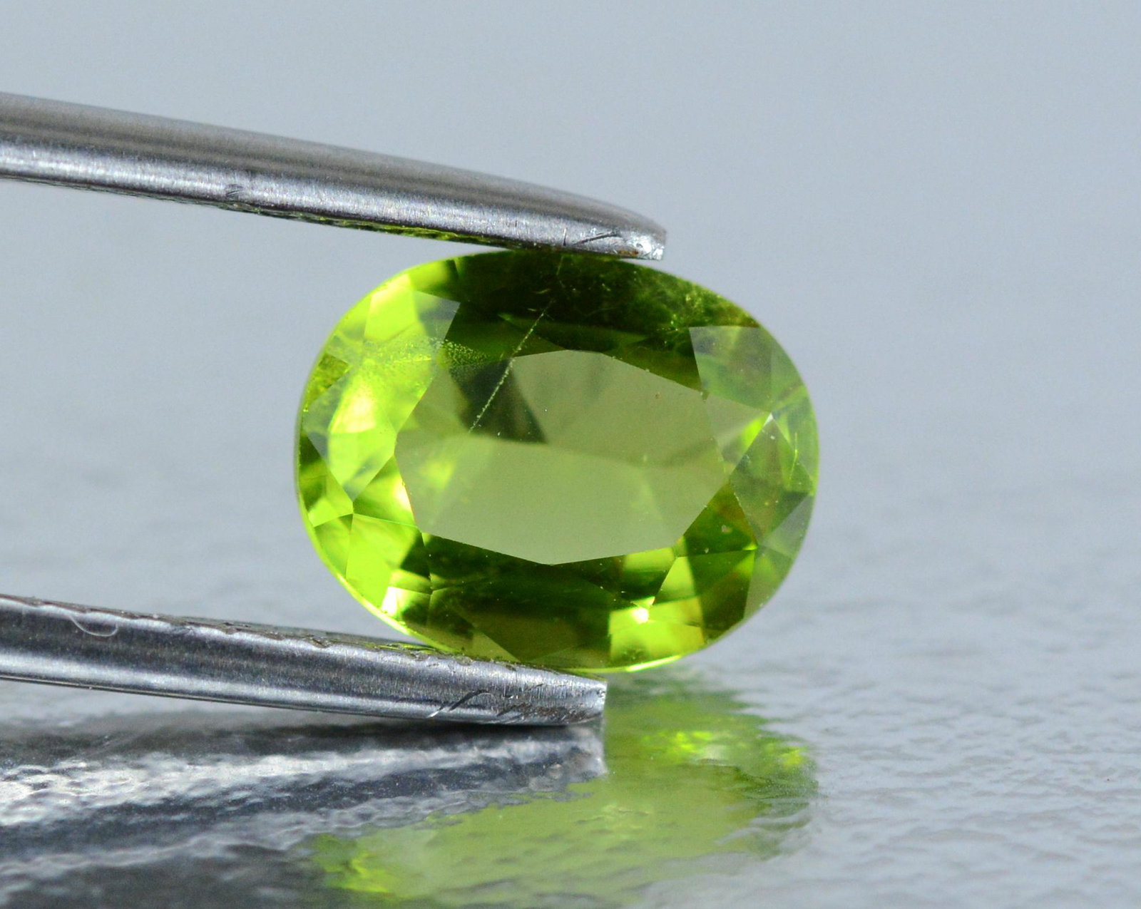 2.15 Cts Top Colour Peridot Gemstone @ Pakistan: Title: 2.15 Cts Top Colour Peridot Gemstone @ Pakistan Origin: Pakistan Weight: 2.15 Carat Size/Dimensions: 9x7x4 mm Reserve: $30.00 Shipping: Domestic: Flat-rate of $12.00 to anywhere within the cont