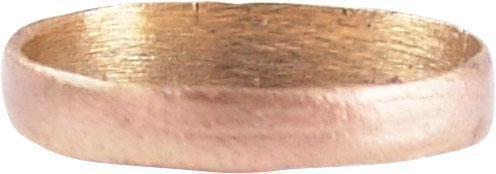 VIKING WOMAN’S WEDDING RING C.1000 AD SIZE 4 ½: Late 9th-early 11th century AD. Rare variation with a rounded face and the width tapering from2.5mm to 3.5mm. Sized for the small finger as was the custom. Very light texture from burial. Vikings exch