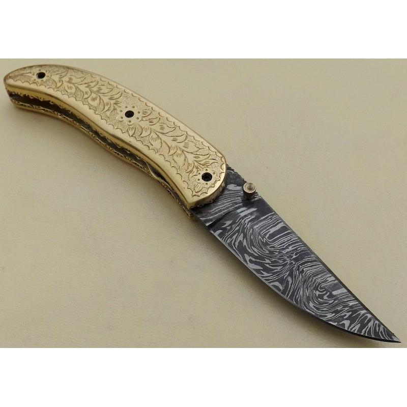 Tracker damascus steel knife brass leather camping: Knife "Hike" Â• Blade - damask steel Â• Handle Â– brass Â• Scabbard - leather (included) Â• Blade hardness Â– 57-59 HRC Â• Total length Â– 204 mm. Â• Blade length - 102 mm. 