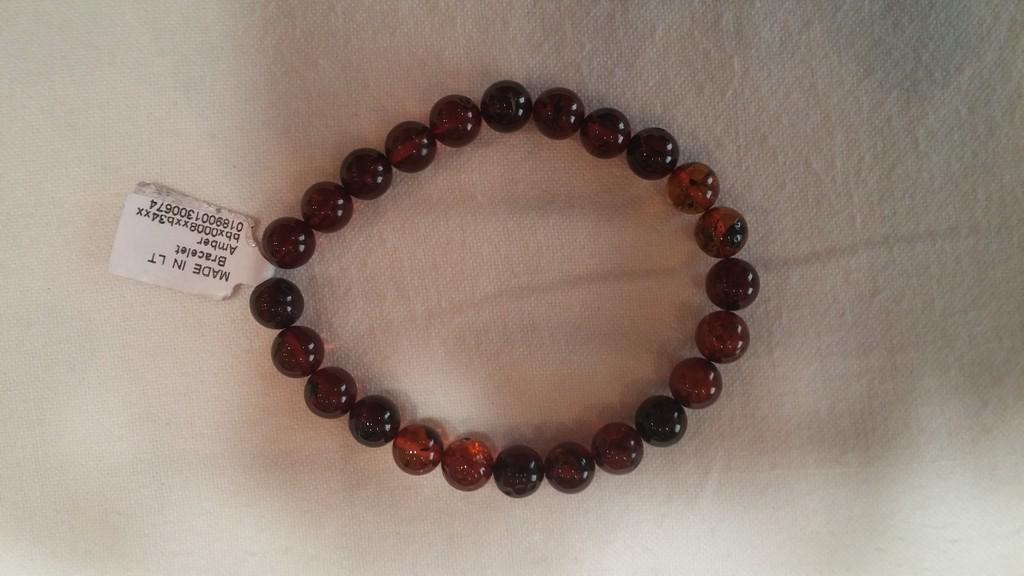 Natural Baltic Amber Bracelet: Title: Natural Baltic Amber Bracelet Materials: Natural Baltic Amber Weight in grams: 7.312308 Additional Information: Natural Baltic Amber Bracelet. Ball shaped. Lemon and light cognac colors. 8mm Di