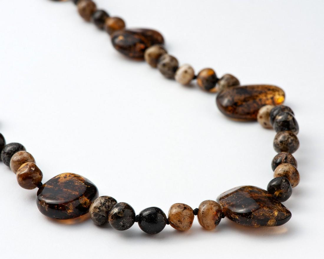 Natural Baltic Amber Necklace: Title: Natural Baltic Amber Necklace Materials: Natural Baltic Amber Weight in grams: 25.178 Additional Information: Natural Baltic Amber Necklace. Baroque shaped. Slag color. Reserve: $50.99 Shipping