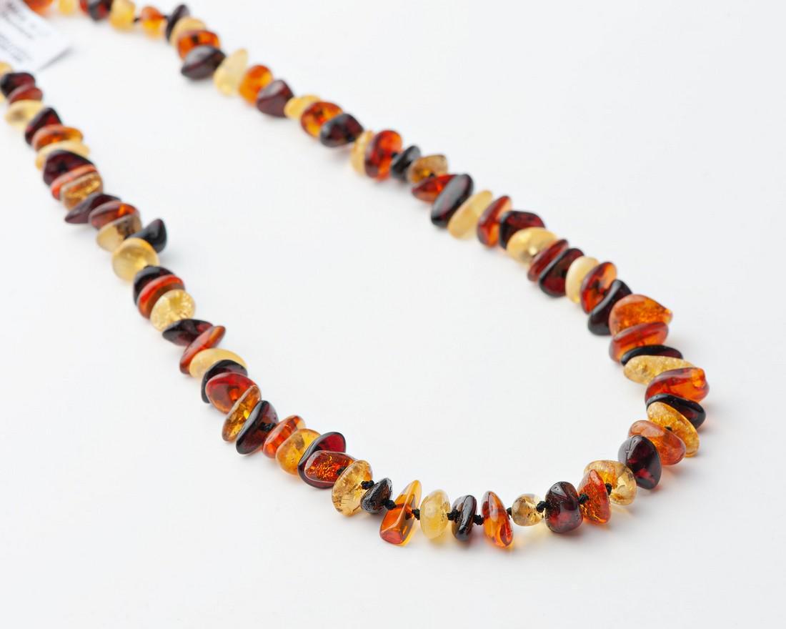 Natural Baltic Amber Necklace: Title: Natural Baltic Amber Necklace Materials: Natural Baltic Amber Weight in grams: 14.73707 Additional Information: Natural Baltic Amber Necklace. Small nugget shaped. Lemon cognac and cherry color
