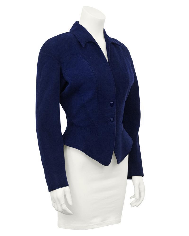 Thierry Mugler Navy Velvet Jacket with Peplum: Super sexy and flattering Thierry Mugler navy cotton velvet jacket from the 1980s. Known for making clothing that hugged every curve of a woman's body, Mugler's pieces are effortless and chic as well