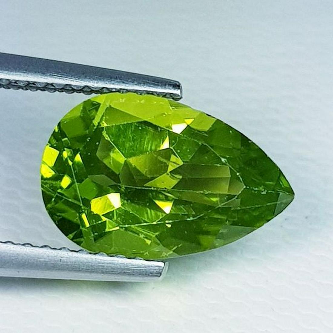 Natural Peridot Pear Cut 3.10 ct: No Reserve! Title: Natural Peridot Pear Cut 3.10 ct Color/Clarity: VVS Gemstones: Loosegemstone Carat Weights: 3.1 Size/Dimensions: 11.90 x 7.80 x 5.10 Additional Information: Pear - Pakistan Shipping