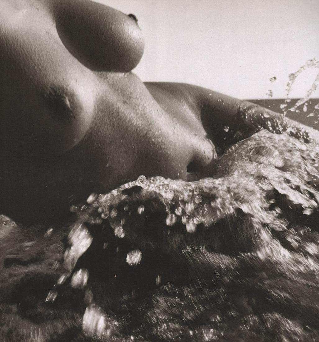 LUCIEN CLERGUE- Nude in the Surf: Artist: LUCIEN CLERGUE Print Title: Nude in the Surf Printing Date: 1990’s Medium: Photoengraving Printed in: France Image Size approx.: 7.5 x 7” Lucien Clergue (French: 1934 – 2014)was a Frenc