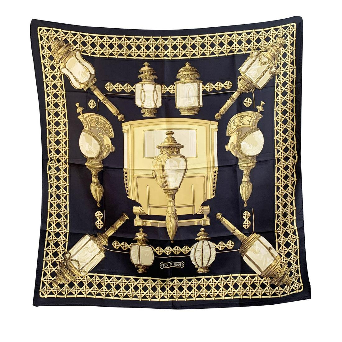 Hermes Paris Vintage Black Silk Scarf Feux de Route: HERMES scarf 'Feux de Route' by Caty Latham and originally issued in 1971. It has re-issued many times in different colours formats and variations of. It features a coach in the center sourrounded by