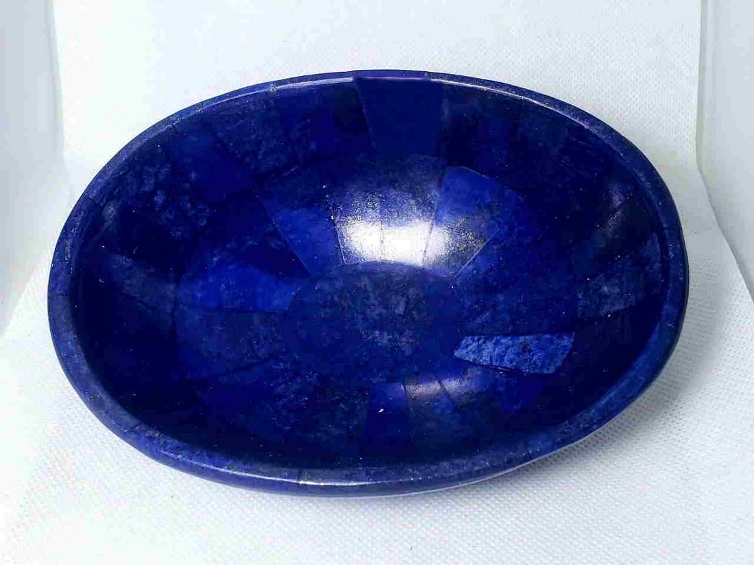 Royal Blue Lapis Lazuli Bowl: Title: Royal Blue Lapis Lazuli Bowl Gemstones: Mineral Carat Weights: 398 Grams Size/Dimensions: 15X11X4 CM Additional Info: Royal Blue Lapis Lazuli Bowl Reserve: $110.00 Shipping: Domestic: Flat-rate