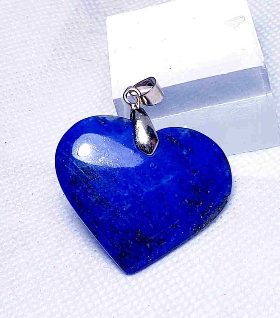Sterling Silver Lapis Lazuli Pendant: Title: Sterling Silver Lapis Lazuli Pendant Gemstones: Mineral Size/Dimensions: 24X26X8 mm Additional Info: Sterling Silver Lapis Lazuli Pendant Reserve: $20.00 Shipping: Domestic: Flat-rate of $65.00