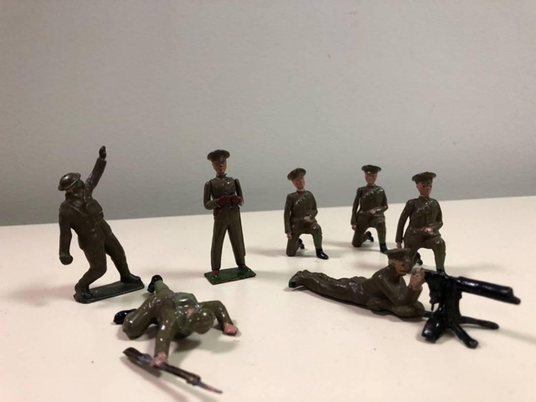 SEVEN (7) WWI BRITAINS SOLDIERS: Title: SEVEN (7) WWI BRITAINS SOLDIERS Date: Origin: Dimension: Provenance/Additional Info: EXCELLENT PLUS, ONE WITH BINOCULARS; ONE WITH MACHINE GUN; ONE CRAWLING AND ONE WITH HAND GRENADE AND THREE 