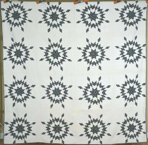 1860's Indigo Blue & White Stars Quilt: This cotton 1860's (most of the fabrics are earlier) pieced stars quilt is hand pieced and hand quilted, with wonderful indigo blue, cheddar and white prints. It measures 86" X 86" and is in very good