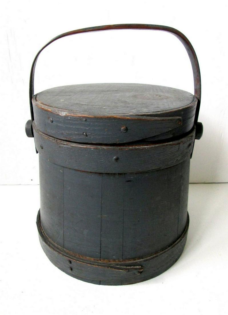 Painted Shaker Firkin: Title: Painted Shaker Firkin Date: C 1860 Material: Ash & Pine Dimension: 8 5/8”H (body), 11 3/4”H (handle up) X 8 3/8” Diam (lid), 9” Diam (base) Provenance/Additional Info: Strong full cover