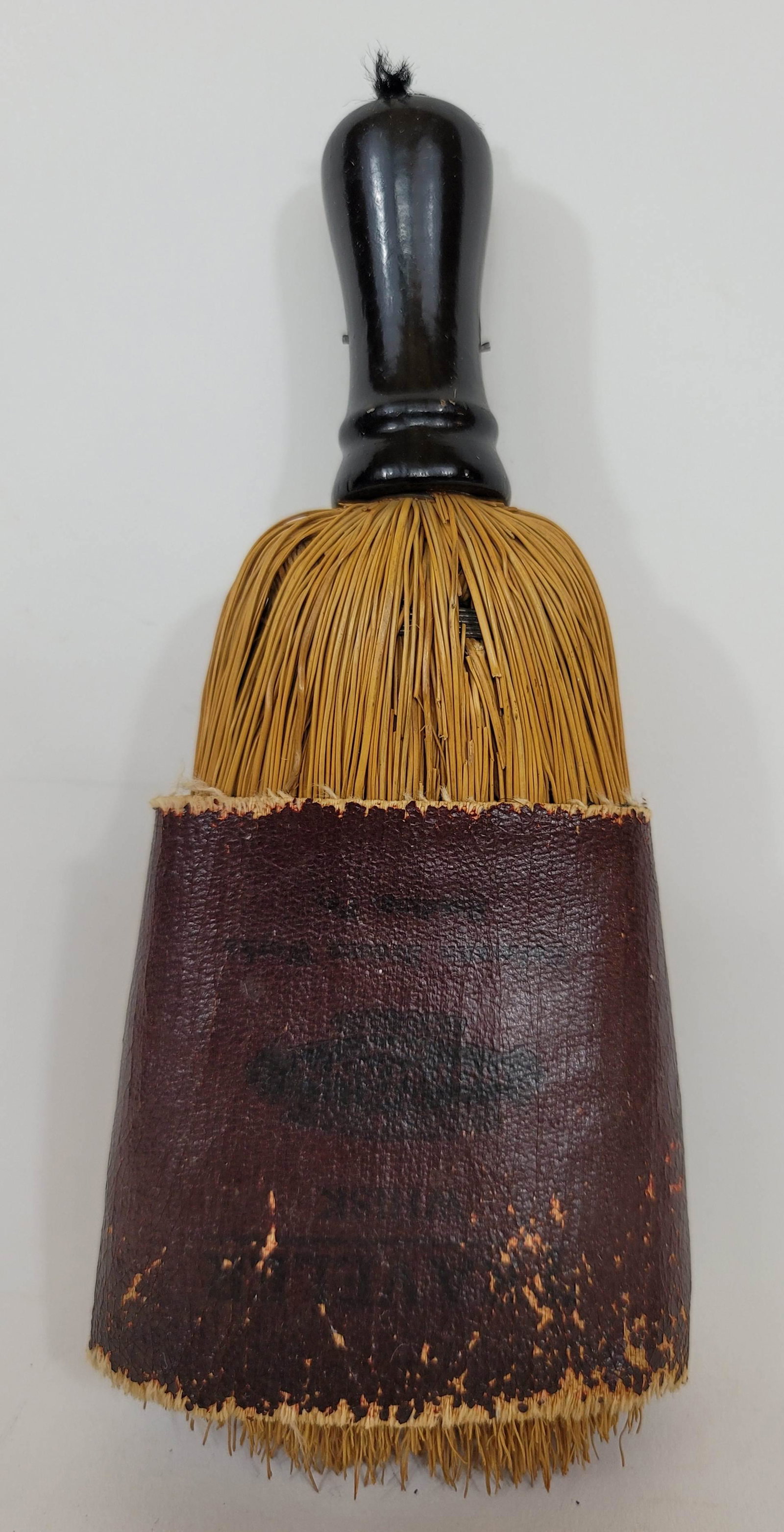 Travelers whisk broom ca 1920's: Title: Travelers whisk broom ca 1920's Description: Travelers whisk broom with glazed canvass cover. Manufactured by Hofmann Broom Works, Reading, Pa. Broom corn, wire and ebonized wood handle. Dimens