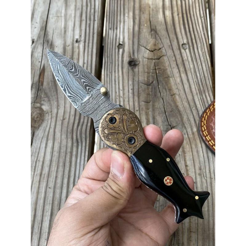 Damascus steel knife, leather sheath, bone and engraved: Knife "Strict" made of damask steel. Handle – bone and engraved bolster, scabbard - leather. Damascus knives are very durable, look great and keep sharpness perfectly. Damascus steel has high qualit