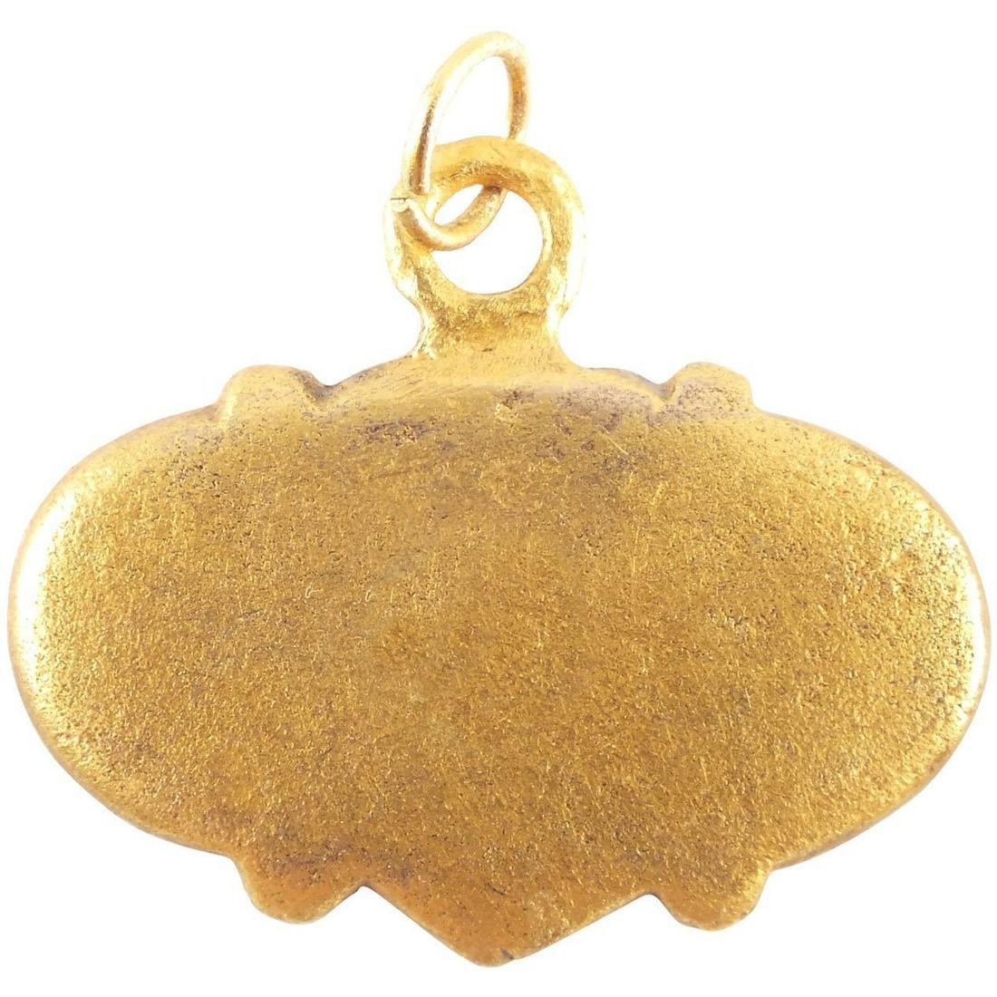 RARE VIKING HEART PENDANT NECKLACE C.1000 AD JEWELRY: A good example in its fully evolved form made by the open face mold technique. Broad representation of low domed form with nubs top and bottom, perhaps indicating a saltire. Over 1Â” width. Iconic 